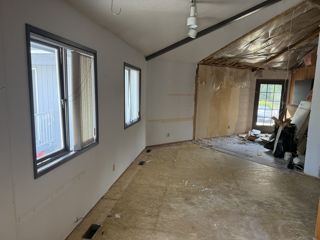 Long view through the future main salon and around the corner
