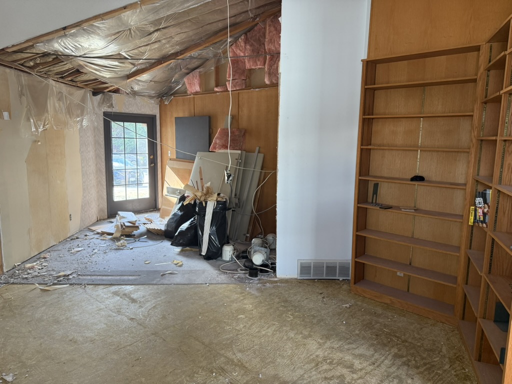 The main salon corner with existing built-in product shelves